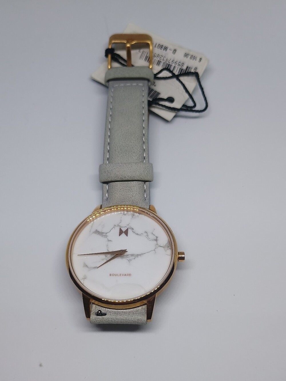 MVMT Boulevard Marble Dial Women's Watch in White and Gold with Gray Strap